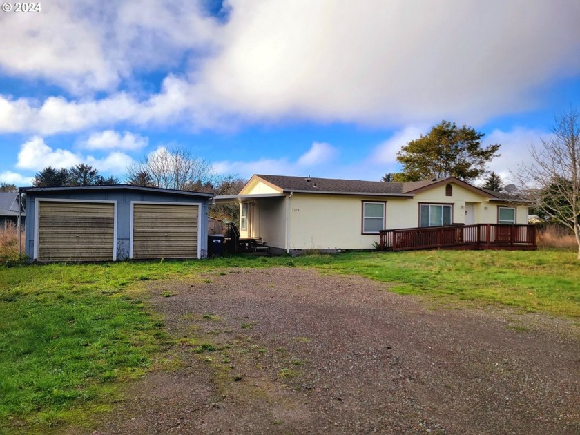 On just over a half acre with ocean views leaving your property - Beach Home for sale in Brookings, Oregon on Beachhouse.com