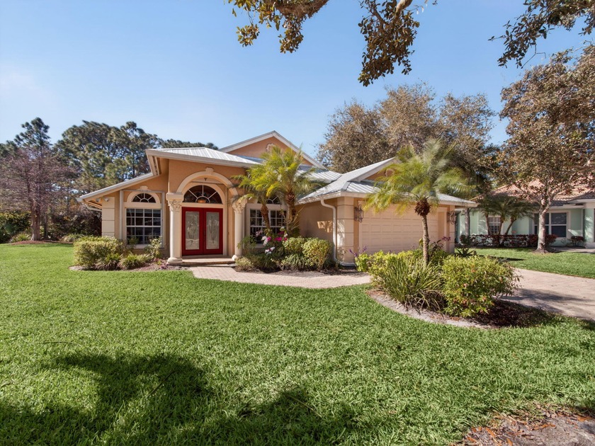 Nestled at the end of a quiet cul-de-sac, this light-filled - Beach Home for sale in Stuart, Florida on Beachhouse.com