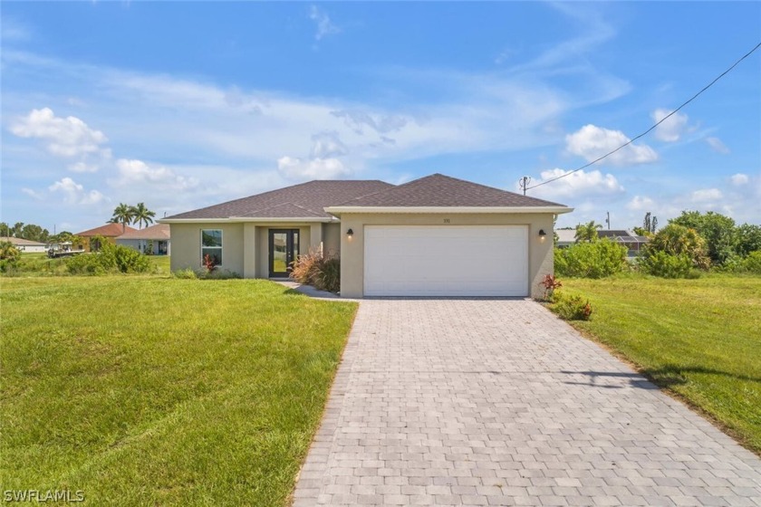 Discover your dream oasis in Cape Coral! This stunning - Beach Home for sale in Cape Coral, Florida on Beachhouse.com