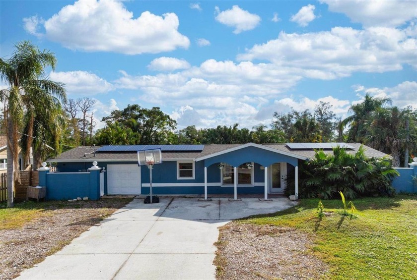 Welcome to Your Tropical Paradise! Nestled in the heart of - Beach Home for sale in Sarasota, Florida on Beachhouse.com
