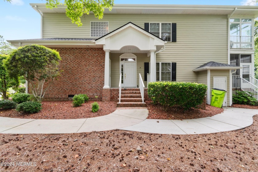 Sit on your enclosed porch and watch the golfers, gators, and - Beach Condo for sale in Sunset Beach, North Carolina on Beachhouse.com