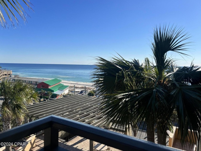 Palm trees with a backdrop of amazing Gulf views right off your - Beach Condo for sale in Panama City Beach, Florida on Beachhouse.com