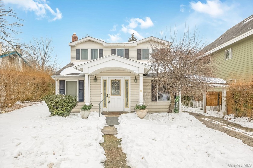 Welcome to this charming 4-bedroom, 2-bath Colonial nestled in - Beach Home for sale in Northport, New York on Beachhouse.com