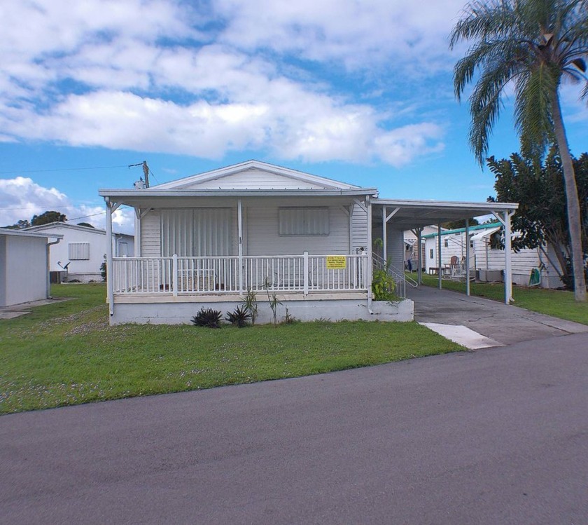 Charming 2005 double-wide mobile home featuring 2 bedrooms and 2 - Beach Home for sale in Sebastian, Florida on Beachhouse.com