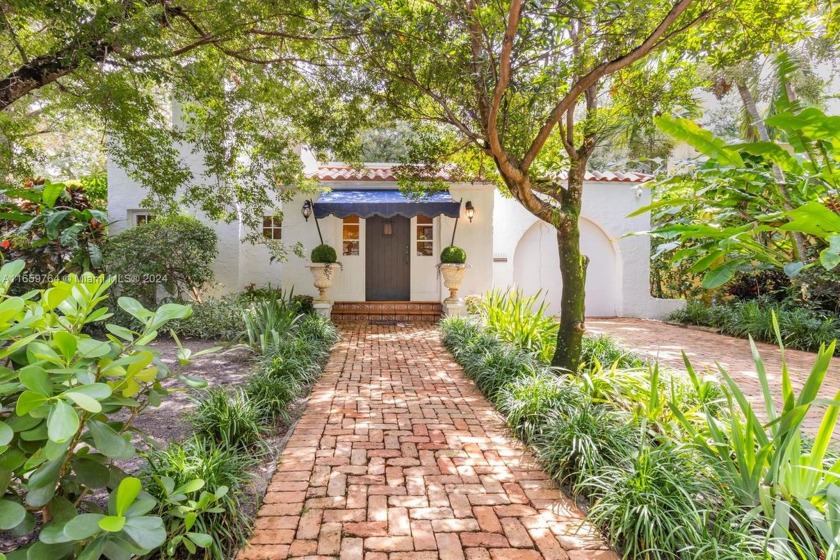 Welcome to this charming Spanish style CBS home nestled in the - Beach Home for sale in Coral Gables, Florida on Beachhouse.com