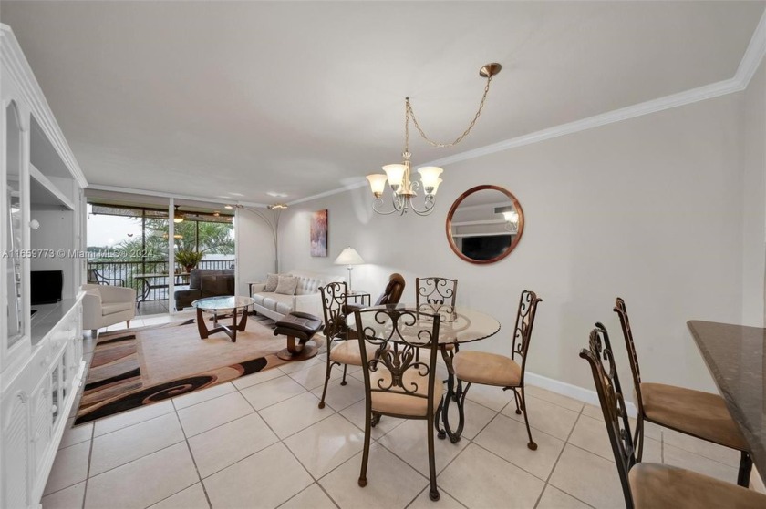 Imagine waking up to serene lake views, where elegance meets - Beach Condo for sale in Oakland Park, Florida on Beachhouse.com