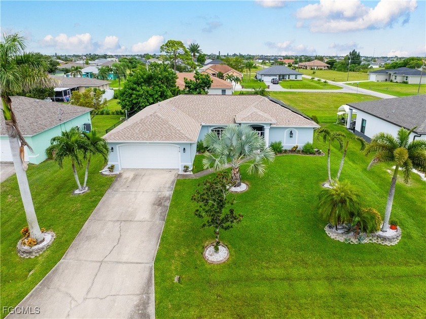 Exceptional Northwest Cape Coral Pool Home with Designer - Beach Home for sale in Cape Coral, Florida on Beachhouse.com