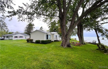 Rare opportunity! TWO lovely homes on one of the largest - Beach Home for sale in Evans, New York on Beachhouse.com