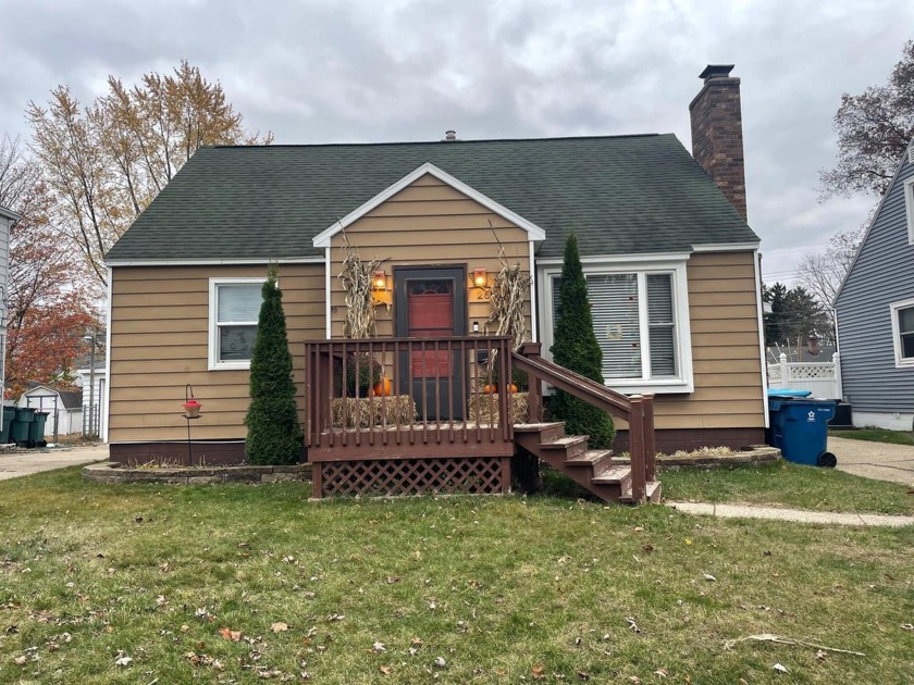 Discover the charm of this adorable Cape Cod home in Norton - Beach Home for sale in Muskegon, Michigan on Beachhouse.com