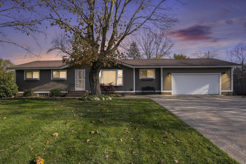 Welcome to 5280 Hillview Drive - This 4 bedroom, 2-1/2 bath home - Beach Home for sale in Norton Shores, Michigan on Beachhouse.com