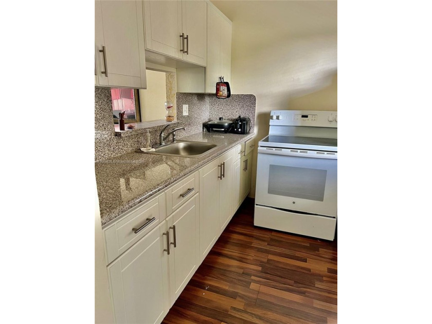 Spacious unit, with lots of natural light, wooden floors for - Beach Condo for sale in Lauderdale Lakes, Florida on Beachhouse.com