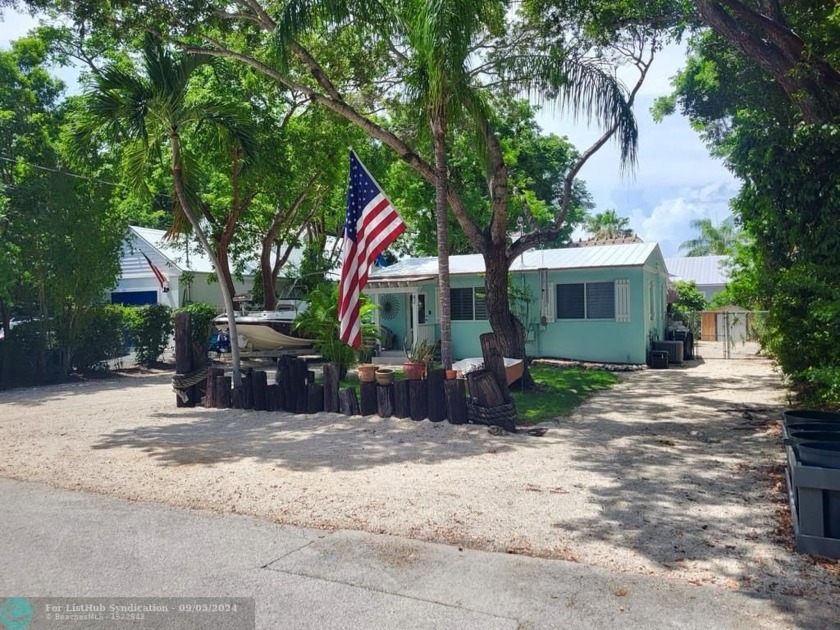 Experience true Florida Keys living in this beautifully updated - Beach Home for sale in Key Largo, Florida on Beachhouse.com