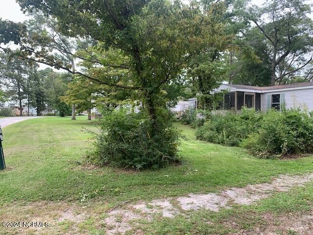 Estate Sale. Older double wide needing TLC, on a large lot with - Beach Home for sale in Cedar Point, North Carolina on Beachhouse.com