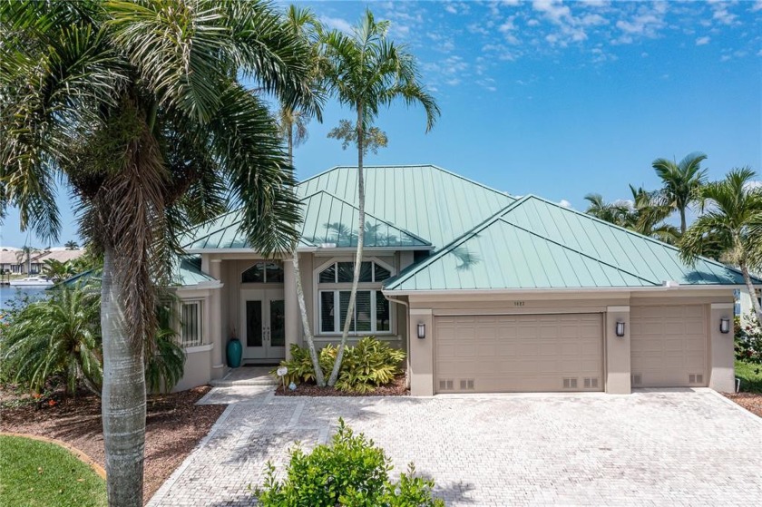 TIP LOT, WATERFRONT HOME W/INTERSECTING CANAL VIEW, 173 FT OF - Beach Home for sale in Punta Gorda, Florida on Beachhouse.com