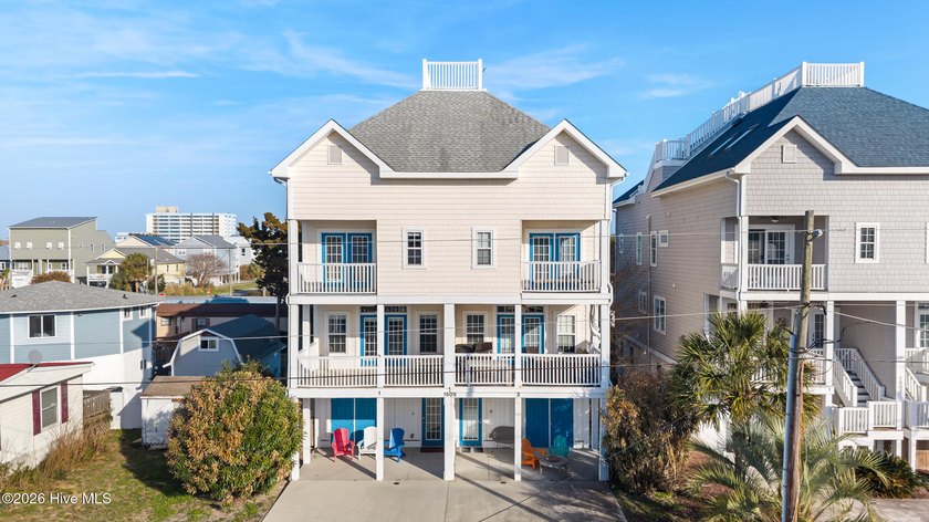 Tucked away just a few blocks from the ocean, this four-story - Beach Condo for sale in Carolina Beach, North Carolina on Beachhouse.com