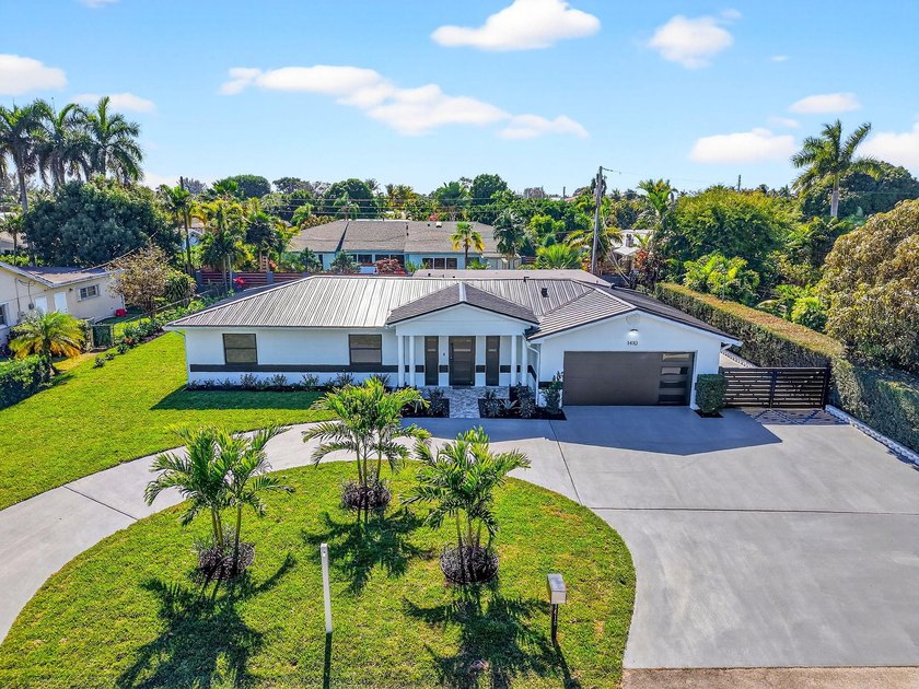 A 5-Star Renovation!!! The Ultimate Transformation in the Town - Beach Home for sale in Lake Clarke Shores, Florida on Beachhouse.com