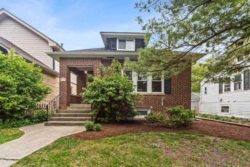 Lovely, 4-bedroom, red brick bungalow on tree-lined street in NW - Beach Home for sale in Evanston, Illinois on Beachhouse.com