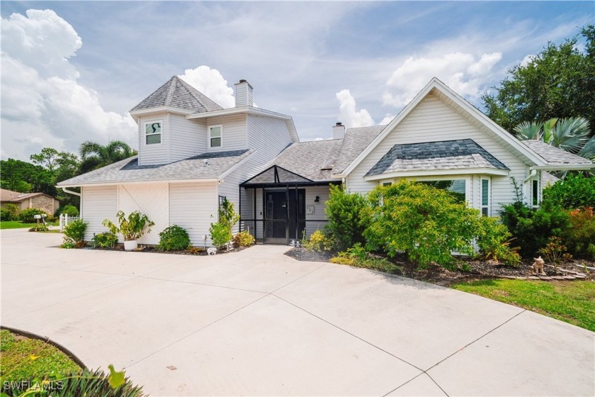 Discover this one-of-a-kind Victorian-style home in Country Club - Beach Home for sale in Lehigh Acres, Florida on Beachhouse.com