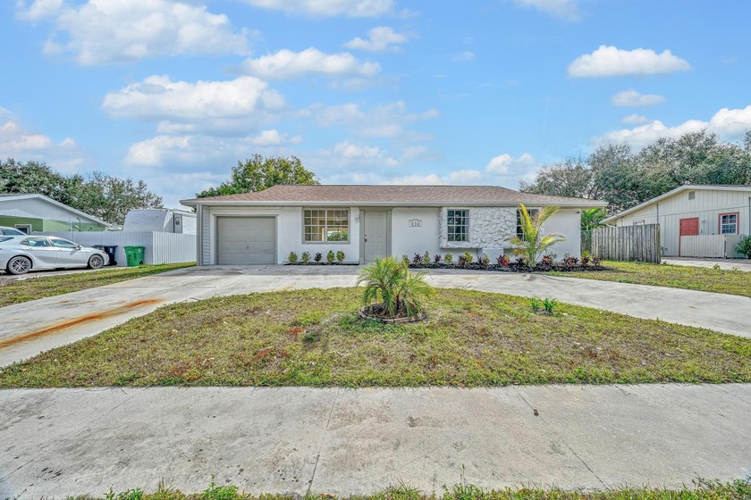 Spacious and updated 3-bedroom, 2-bath home with a bonus room - Beach Home for sale in Port Saint Lucie, Florida on Beachhouse.com
