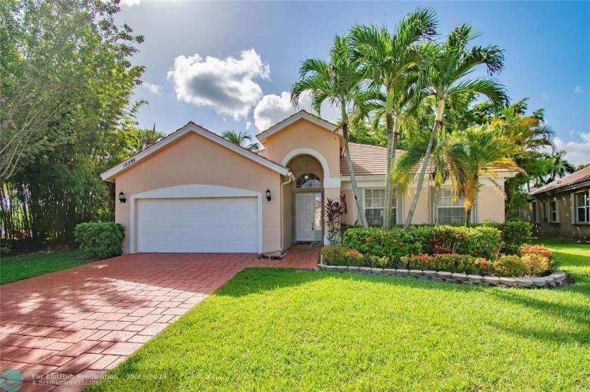 This charming single story family home is nestled in the - Beach Home for sale in Boca Raton, Florida on Beachhouse.com