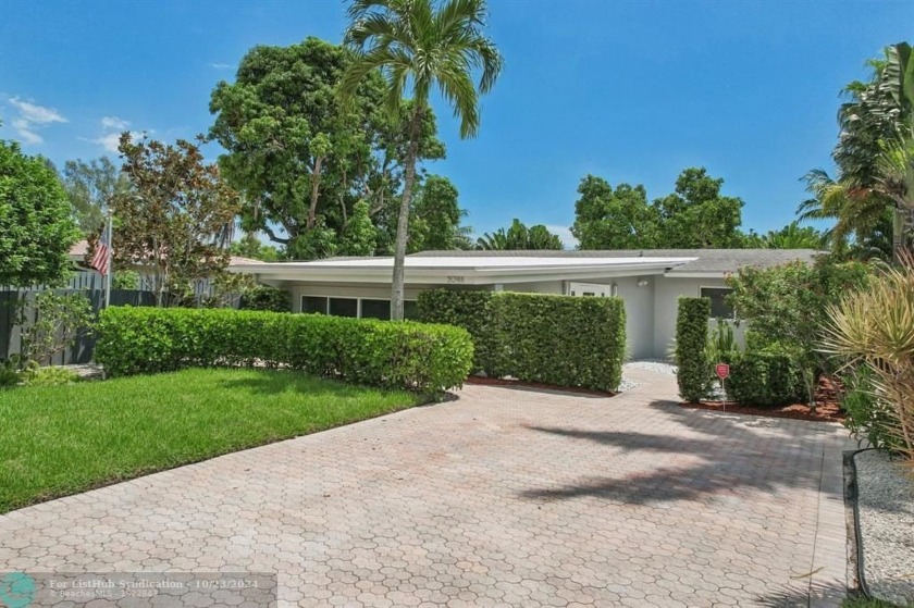 Nestled in the heart of Coral Brook, this stunning pool home - Beach Home for sale in Oakland Park, Florida on Beachhouse.com