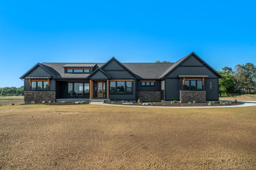 Expansive custom ranch to be built offering a HUGE main floor - Beach Home for sale in Saugatuck, Michigan on Beachhouse.com