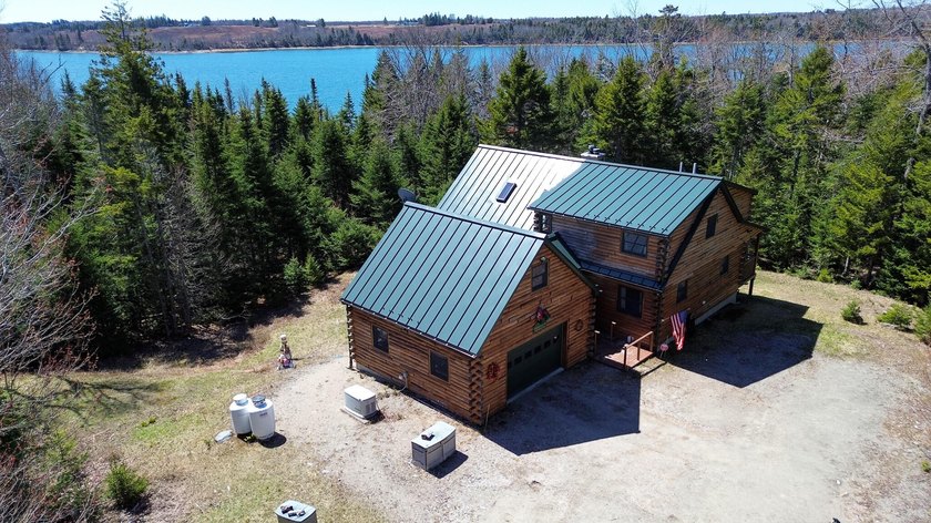 Built in 2009 by Jonesboro's Chandler River Log Homes, this - Beach Home for sale in Jonesboro, Maine on Beachhouse.com
