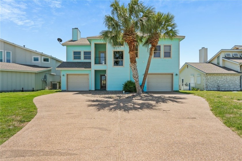 Beautiful custom designed hardy plank canal-front home. Hardwood - Beach Home for sale in Rockport, Texas on Beachhouse.com