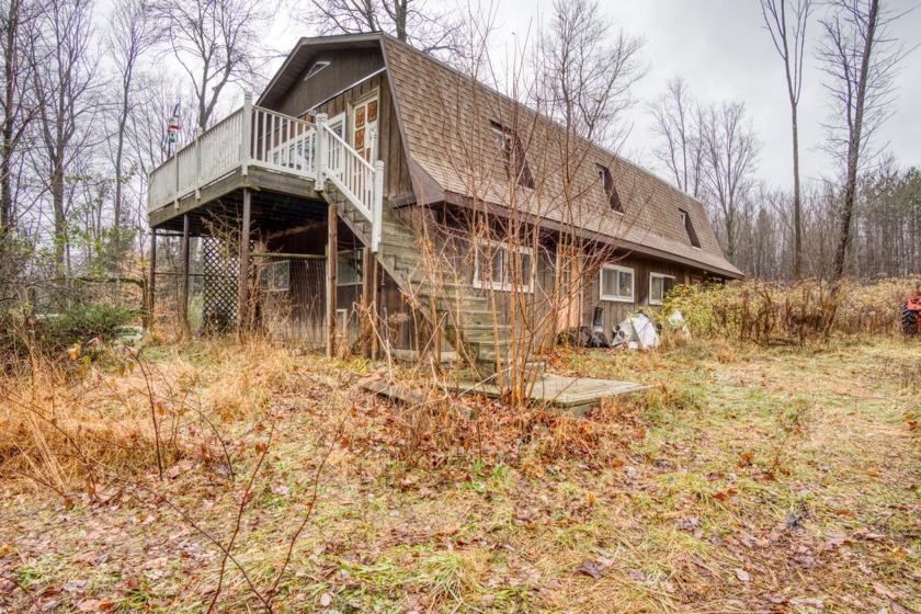 This 2-bedroom, 1-bathroom cottage sits on 8.1 acres, offering a - Beach Home for sale in Ludington, Michigan on Beachhouse.com