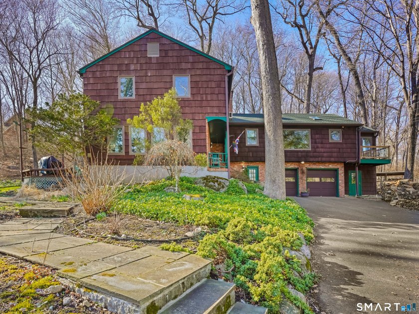 Private & tucked away on the Stamford/New Canaan border, you'll - Beach Home for sale in Stamford, Connecticut on Beachhouse.com