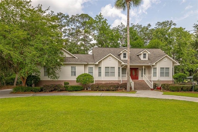 Tucked within the gated community of Oak Grove Island, 189 - Beach Home for sale in Brunswick, Georgia on Beachhouse.com