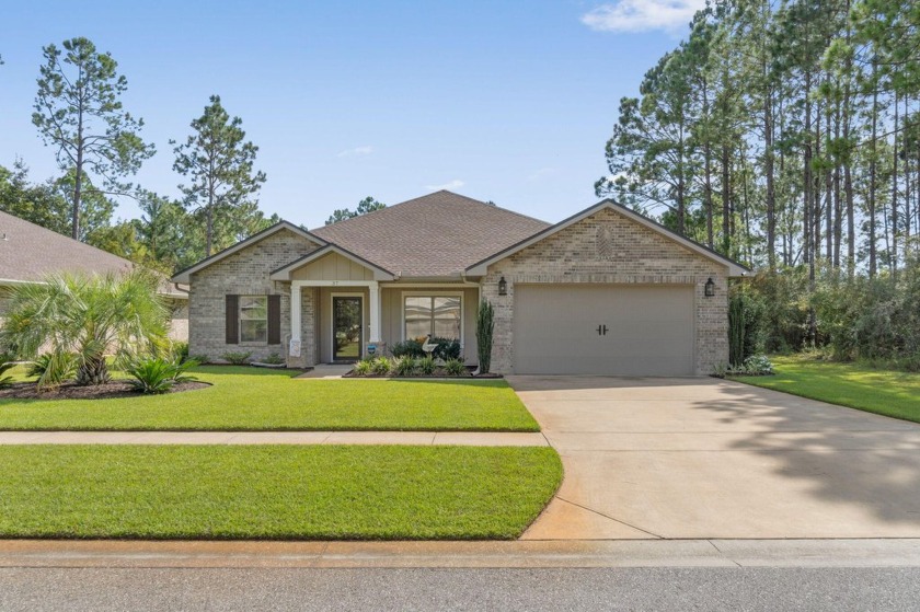 Welcome to this stunning lakefront home in Symphony, offering a - Beach Home for sale in Freeport, Florida on Beachhouse.com