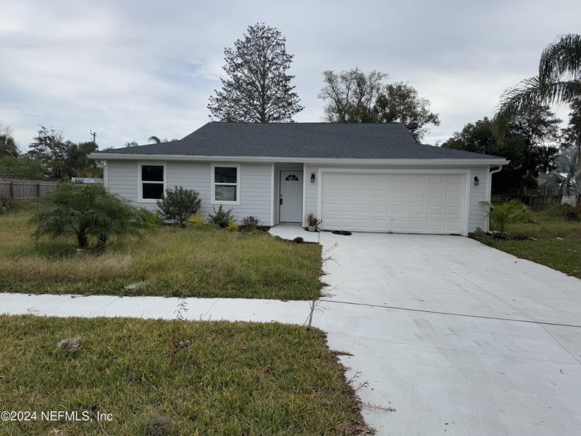 This 3-bedroom, 2-bath home with a 2-car garage and a fireplace - Beach Home for sale in Jacksonville, Florida on Beachhouse.com