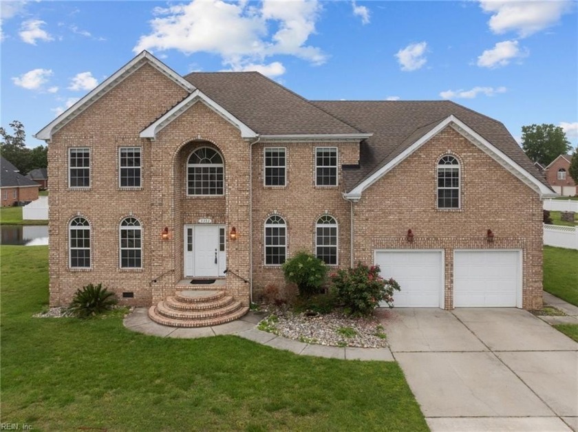 This stunning all-brick home is nestled on a picturesque - Beach Home for sale in Suffolk, Virginia on Beachhouse.com