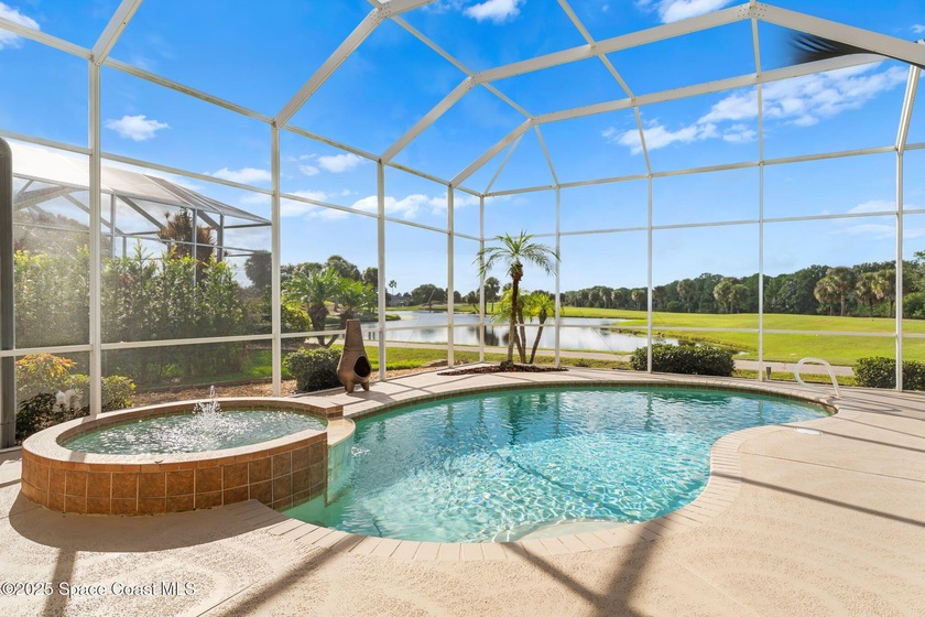 Discover resort-style living in Viera East Golf Club with this - Beach Home for sale in Rockledge, Florida on Beachhouse.com