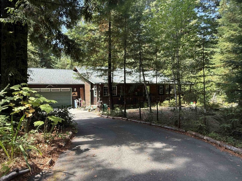 Nestled in the heart of the majestic Redwoods, this custom-built - Beach Home for sale in Crescent City, California on Beachhouse.com