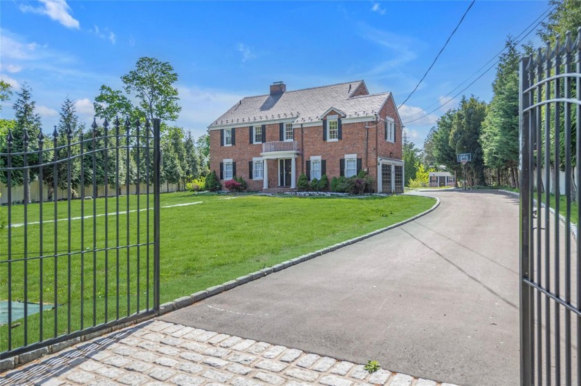 A true gem in Glen Cove, NY. This rare all brick colonial is - Beach Home for sale in Glen Cove, New York on Beachhouse.com