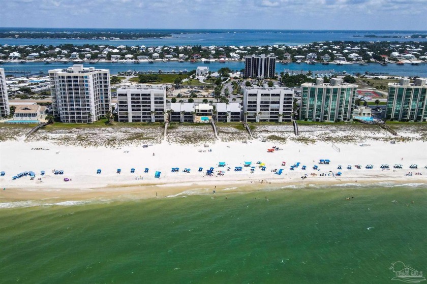 RELAX & ENJOY ISLAND LIVING IN THIS BEAUTIFULLY MAINTAINED TWO - Beach Home for sale in Perdido Key, Florida on Beachhouse.com