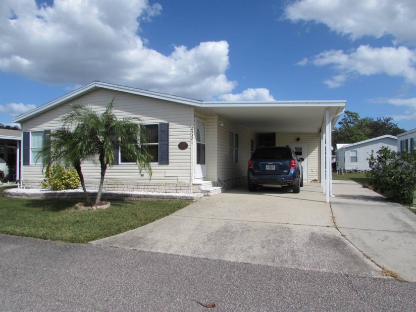 FURNISHED 2 BEDROOM 2 BATH PALM HARBOR WITH DEN  Lovely home in - Beach Home for sale in Trinity, Florida on Beachhouse.com