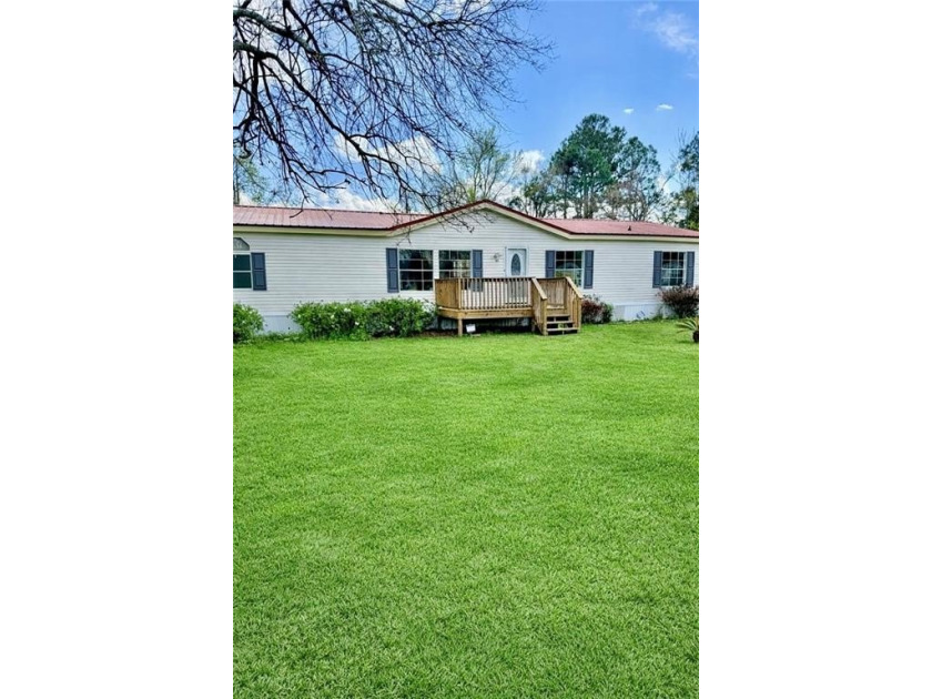 COMPLETELY GUTTED & REMODELED!!  This spacious, MOVE IN READY - Beach Home for sale in Brunswick, Georgia on Beachhouse.com
