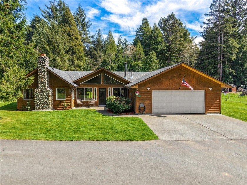 Set on a beautifully maintained, park-like acre, this 4-bedroom - Beach Home for sale in Crescent City, California on Beachhouse.com
