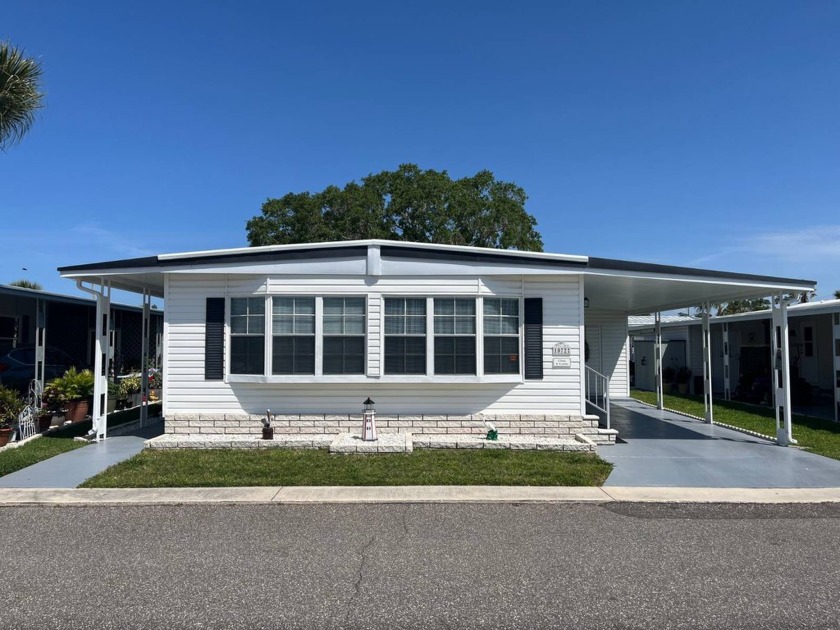 Neat, tidy, well-kept home with good bones and more. Roof with - Beach Home for sale in Largo, Florida on Beachhouse.com