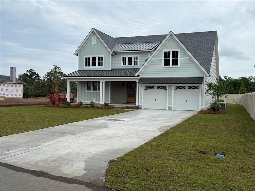 Welcome to this stunning Marshview Retreat, custom home by - Beach Home for sale in Saint Simons, Georgia on Beachhouse.com