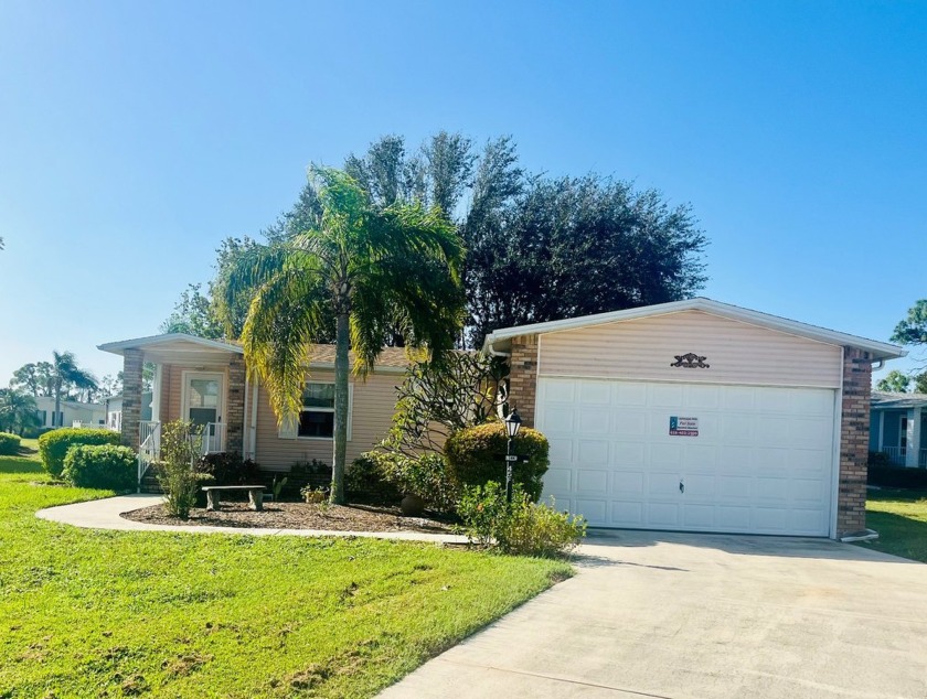 Discover Your New Home! This spacious two-bedroom, two-bath home - Beach Home for sale in North Fort Myers, Florida on Beachhouse.com