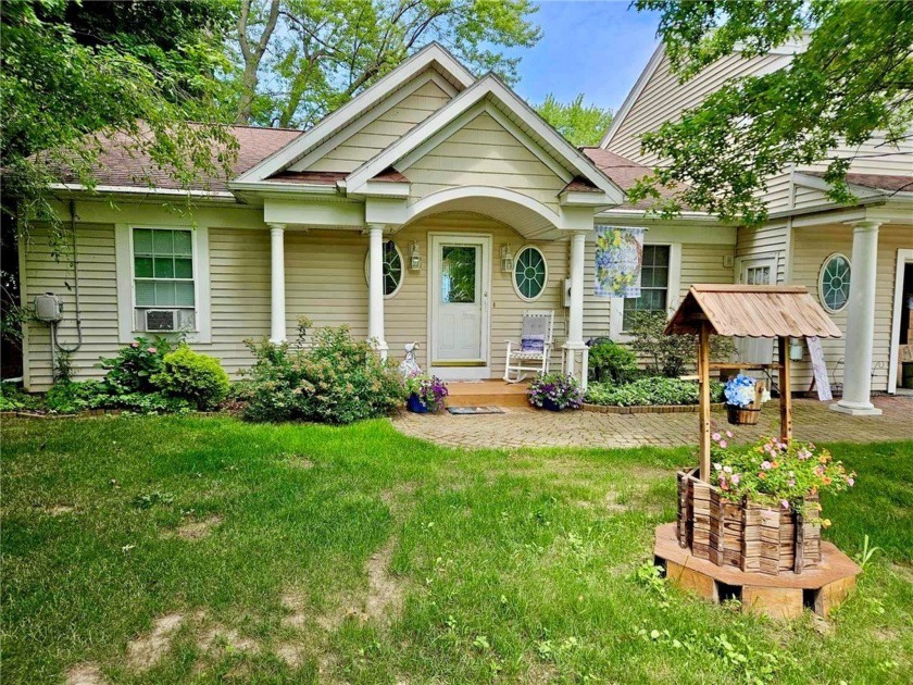 Experience lakeside living at its finest in this stunning Lake - Beach Home for sale in Hamlin, New York on Beachhouse.com