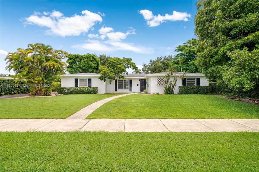 A golfer's paradise! This stunning 4-bedroom, 2 full-bath - Beach Home for sale in Miami, Florida on Beachhouse.com