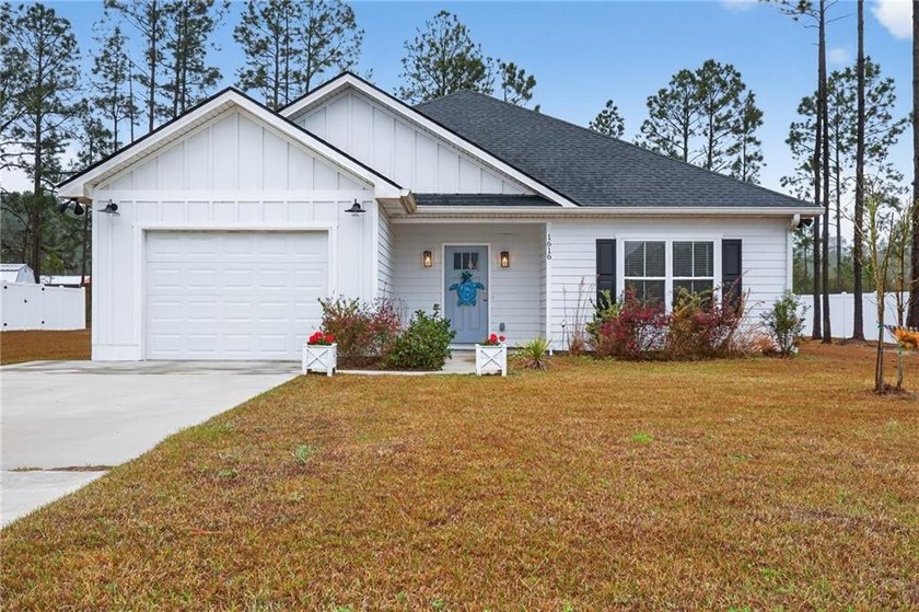 Welcome to this 3-bedroom, 2-bath home offering 1,588 square - Beach Home for sale in Darien, Georgia on Beachhouse.com