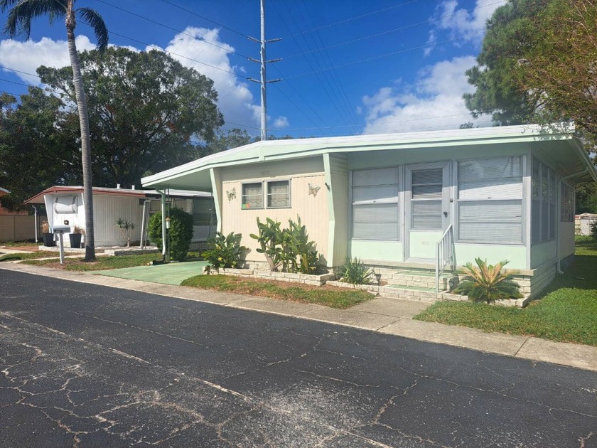 Split Floor Plan with Two Bedrooms, 1.5 Bathrooms and Enclosed - Beach Home for sale in Dunedin, Florida on Beachhouse.com