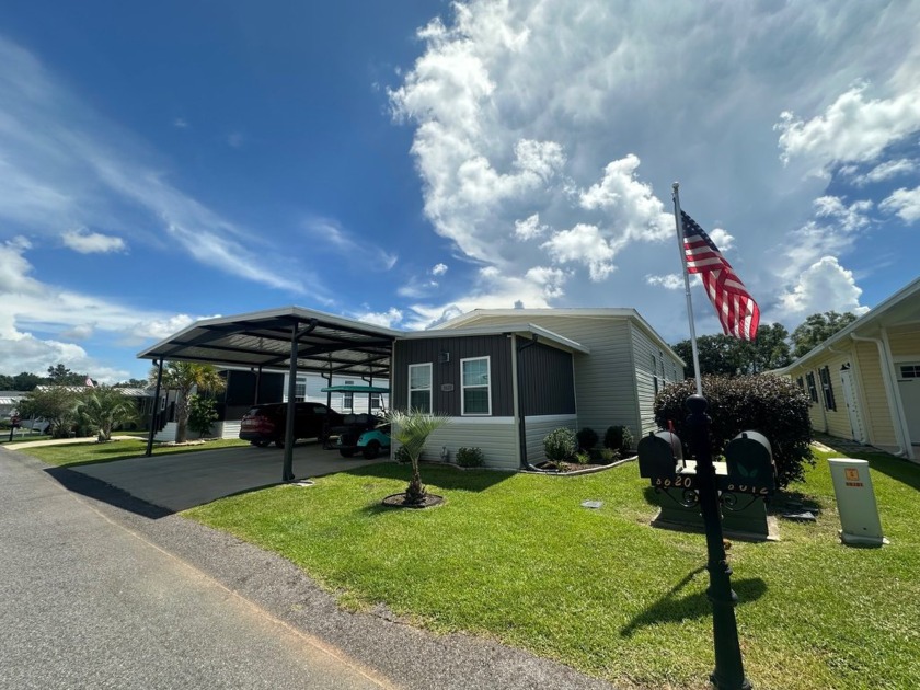 Located in the Foley Grove, a charming land-leased 55+ - Beach Home for sale in Foley, Alabama on Beachhouse.com