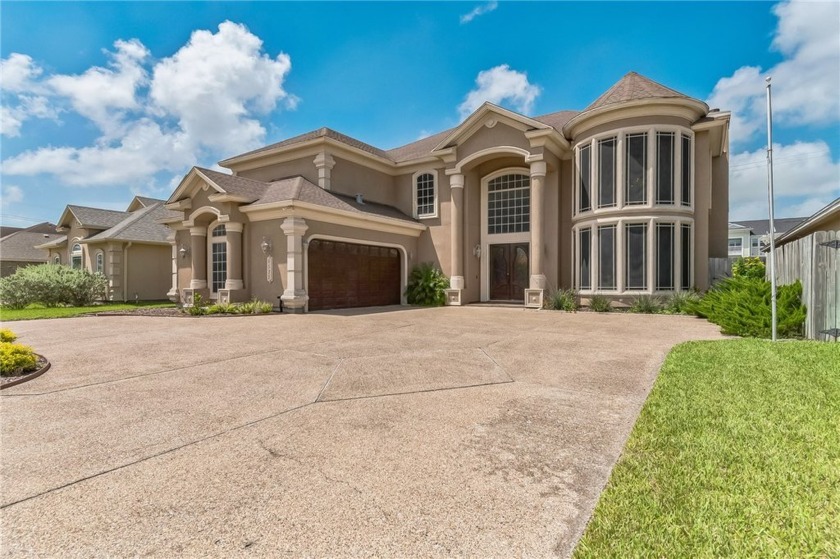 This masterpiece in the cozy, gated community of Cimarron Lake - Beach Home for sale in Corpus Christi, Texas on Beachhouse.com